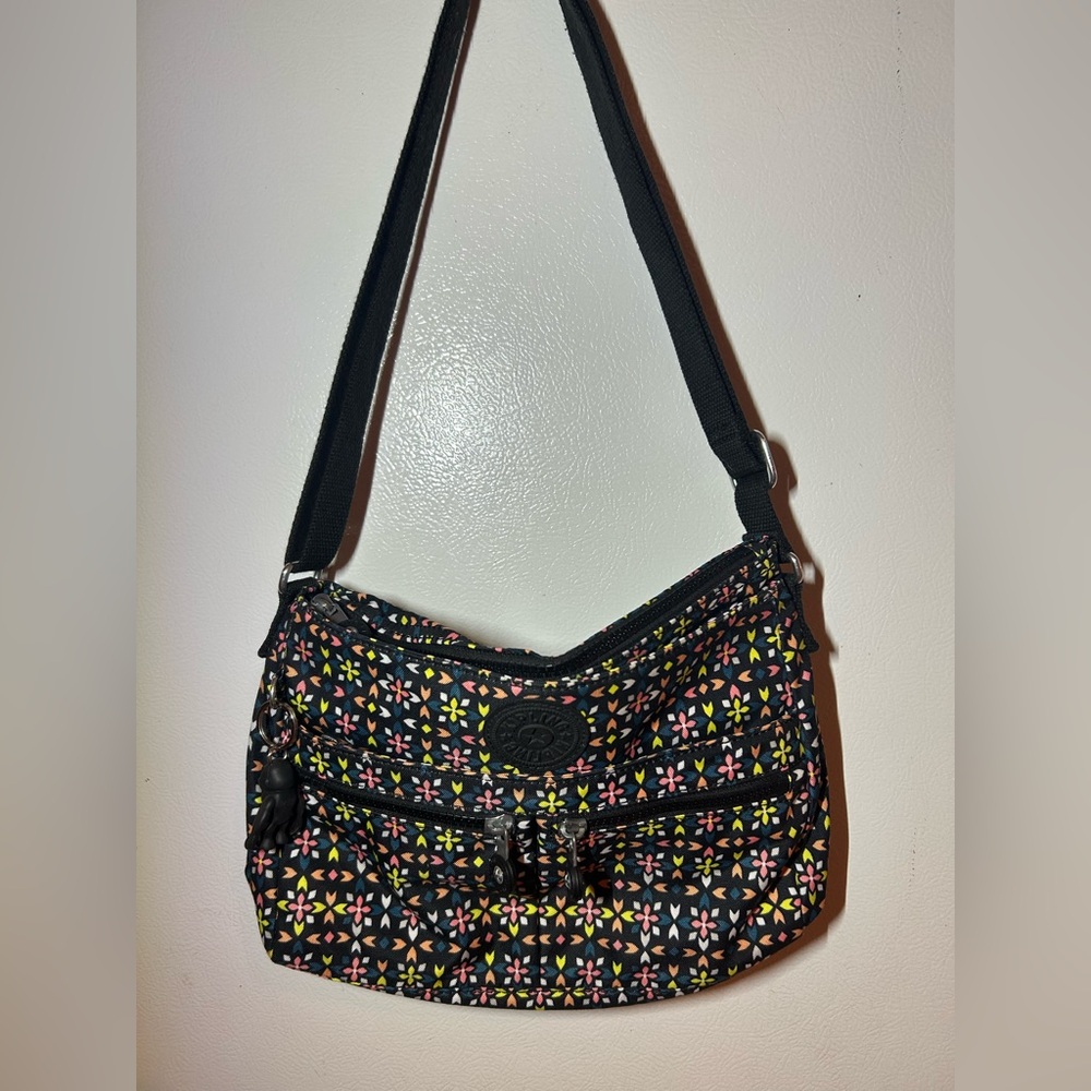 Multicolored Kipling Crossbody/Shoulder Bag. 
L: 12 in
H: 8 in
W: about 2.5 in